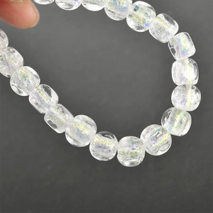 Clear iridescent glass beads with shimmering glitter for DIY jewelry and bracelets