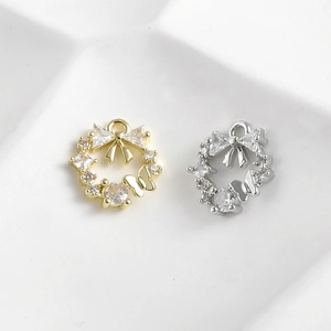 14k vergoldeter Kranzanhänger mit Schleife und Schmetterling für DIY Schmuckherstellung