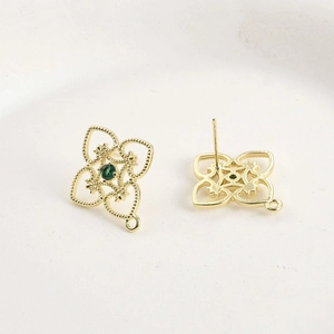 Detail of 14k gold plated clover earring post with green stone and DIY hanging loop
