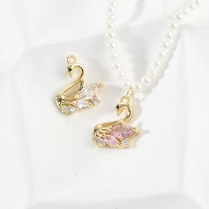 Elegant 14k gold-filled pink zircon swan pendant for necklace and jewelry making