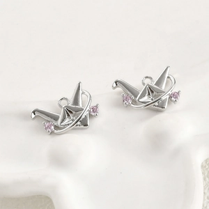 Detail of 14k gold-filled origami crane pendants with pink cubic zirconia accents