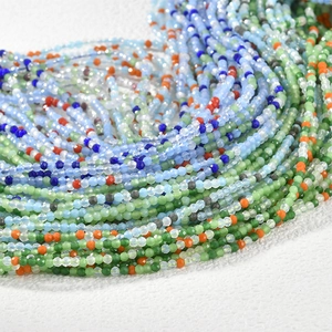 Macro detail of 2mm faceted colorful glass beads for DIY jewelry making and beadwork
