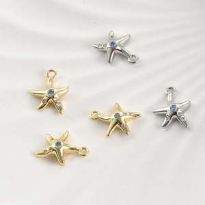 Starfish pendant charms in gold and silver plating with blue gemstone and rhinestones