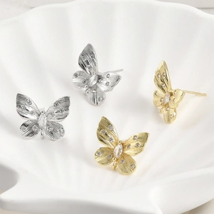 Gouden en zilveren vlinderhangers met zirkonia voor het maken van DIY-sieraden