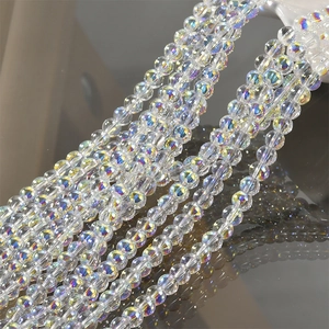 Macro shot of iridescent bubble glass beads with rainbow coating for DIY jewelry making