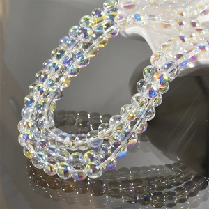 Macro detail of iridescent mermaid bubble glass beads with aurora AB coating for jewelry