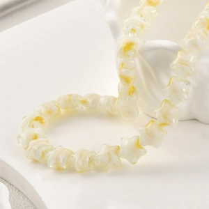 Handgefertigte Millefiori-Stern-Glasperlen mit gelbem Wirbelmuster für DIY-Schmuck