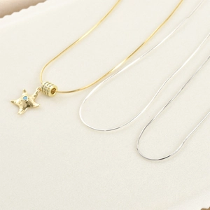18k goud en zilver slangenketting halsketting met sterhanger en kristallen kraal