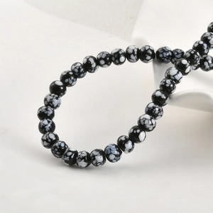 Polished black and white snowflake obsidian beads for DIY jewelry making and bracelets