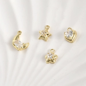 Detail of 14k gold plated moon star heart flower pendants with cubic zirconia for DIY