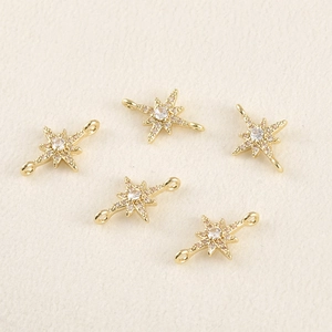 Macro-detail van 14k vergulde sterconnectoren met zirkonia voor DIY-sieraden maken