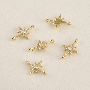 Detail van 14k vergulde sterconnectoren met zirkonia voor het maken van sieraden