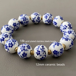 Detail showing 12mm blue and white porcelain beads with 18K gold-plated stainless steel beads