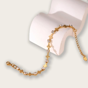 18K gold plated stainless steel bracelet with cross links and sparkling cubic zirconia