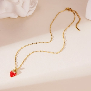 Elegant 18K gold plated necklace featuring a red strawberry pendant with zircon accents