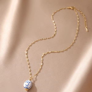 18K gold plated stainless steel necklace with oval blue tulip ceramic pendant
