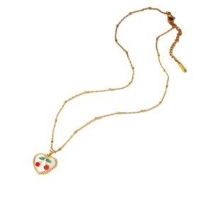 Elegant 18K gold plated bead chain necklace with heart cherry enamel pendant on white background