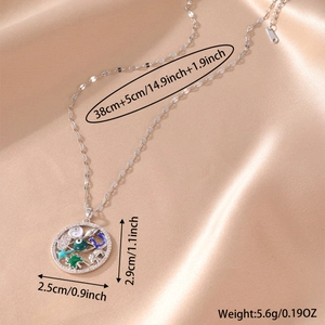Minimalistische koperen ketting met boom en dier hanger bezet met zirkonia