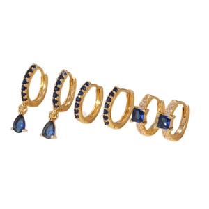 Three pairs of gold-plated hoop earrings featuring blue zircons and drop pendants