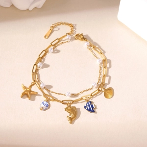 18K vergoldetes Edelstahl-Armband mit Meeresanhängern und weißen Perlen