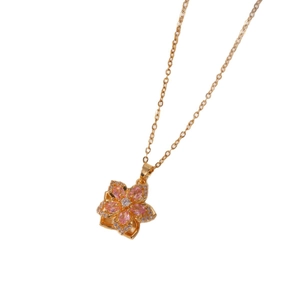 Rotating pink zircon cherry blossom flower pendant necklace with elegant gold finish chain