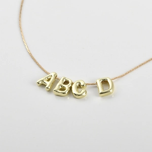 14k gold-plated 3D alphabet letter pendants on a dainty chain for jewelry making