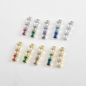 Detailed view of 14k gold-plated bamboo-style pendants with gradient zircon for DIY jewelry