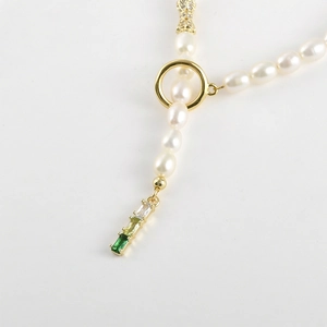 White pearl necklace with 14k gold-plated bamboo joint pendant and colorful zircon stones