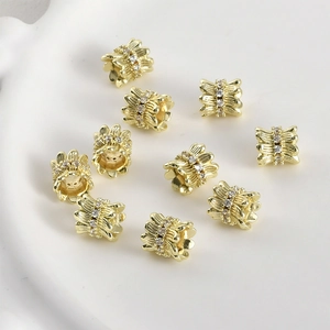 14k gold plated cylinder spacer beads with pavé zircon and textured vertical stripes