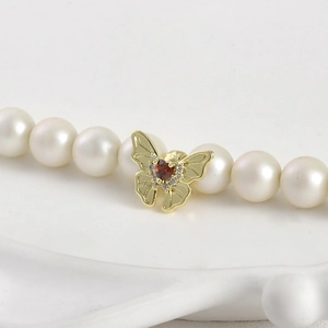 14k gold plated butterfly charm with red heart zircon on elegant white pearl necklace