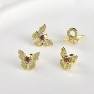 Butterfly charm with red heart zircon in 14k gold plating for jewelry making