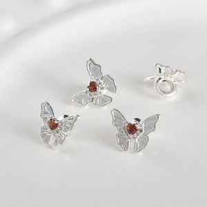 14k gold-plated 925 silver butterfly charm with heart-shaped red gemstone and zircon accents