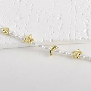 Summer ocean style necklace with white pearls and 14k gold plated sea animal charms