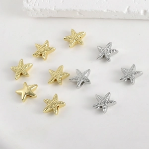 Close-up of 14k gold plated starfish spacer beads in matte and polished finishes