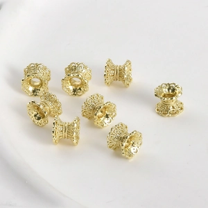 Detail of 14k gold-plated lace hollow spacer beads for DIY jewelry making and crafts