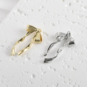 Polished 14k gold and silver ribbon bow pendants for DIY jewelry making