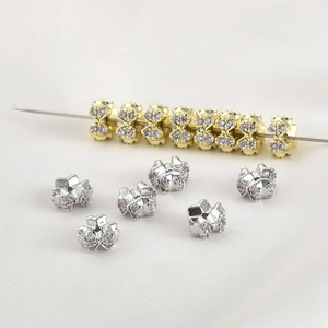 Bow tie shaped micro-pave pink zircon beads in 14k gold and silver plating for DIY jewelry