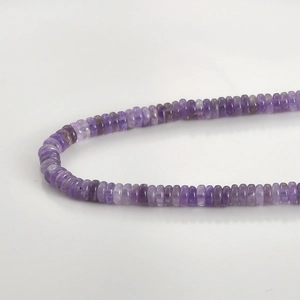 Macro shot of natural purple amethyst rondelle beads for DIY jewelry making material