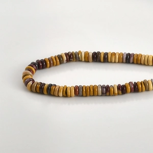 Macro view of colorful 2x6mm flat rondelle natural stone beads for DIY jewelry making