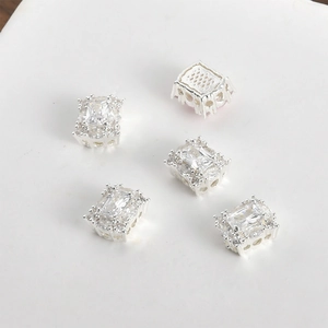 Macro shot of 14K silver plated rectangular cubic zirconia spacer beads for DIY jewelry