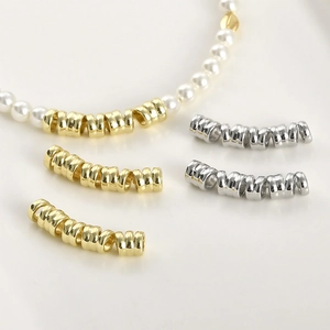 Polished 14k gold-plated spiral beads for DIY jewelry making on pearl necklace
