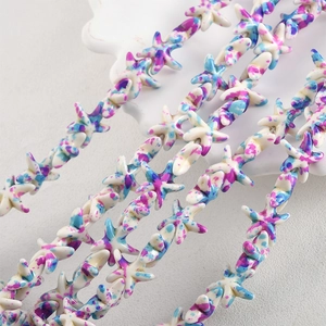 Macro detail of starfish beads with vintage purple and blue oil painting splash texture