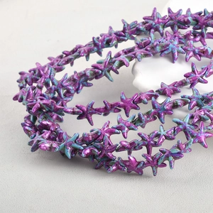 Detailed macro shot of vintage starfish beads with purple and turquoise marble texture
