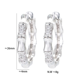 Bamboo style geometric earrings with micro-set diamonds, 26mm height detail view