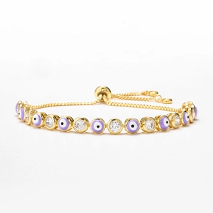 Bracciale dorato regolabile con perline occhio del diavolo viola e pietre di zircone