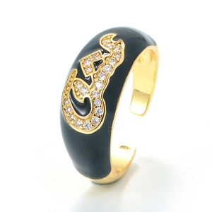 Adjustable gold ring with black enamel drip oil and micro-pave cubic zirconia symbols