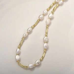 Baroque pearl necklace with 14k gold plated triangular tubes and faceted connectors