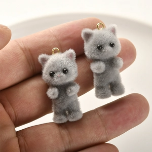 Two gray flocked kitten pendants with gold rings for DIY jewelry and keychain crafts