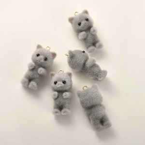 Detailed views of 3D plush grey cat pendants with gold rings for DIY jewelry making