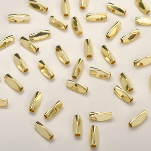 Detailed view of 14K gold-plated faceted tube beads for DIY jewelry making material